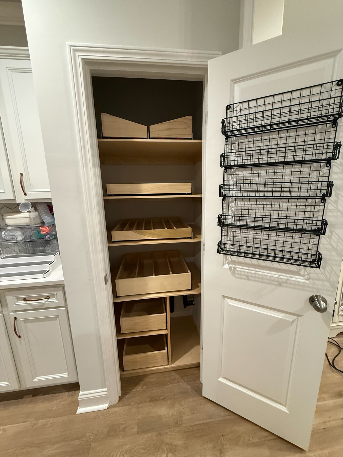 Custom pantry organizer with pull-out drawers