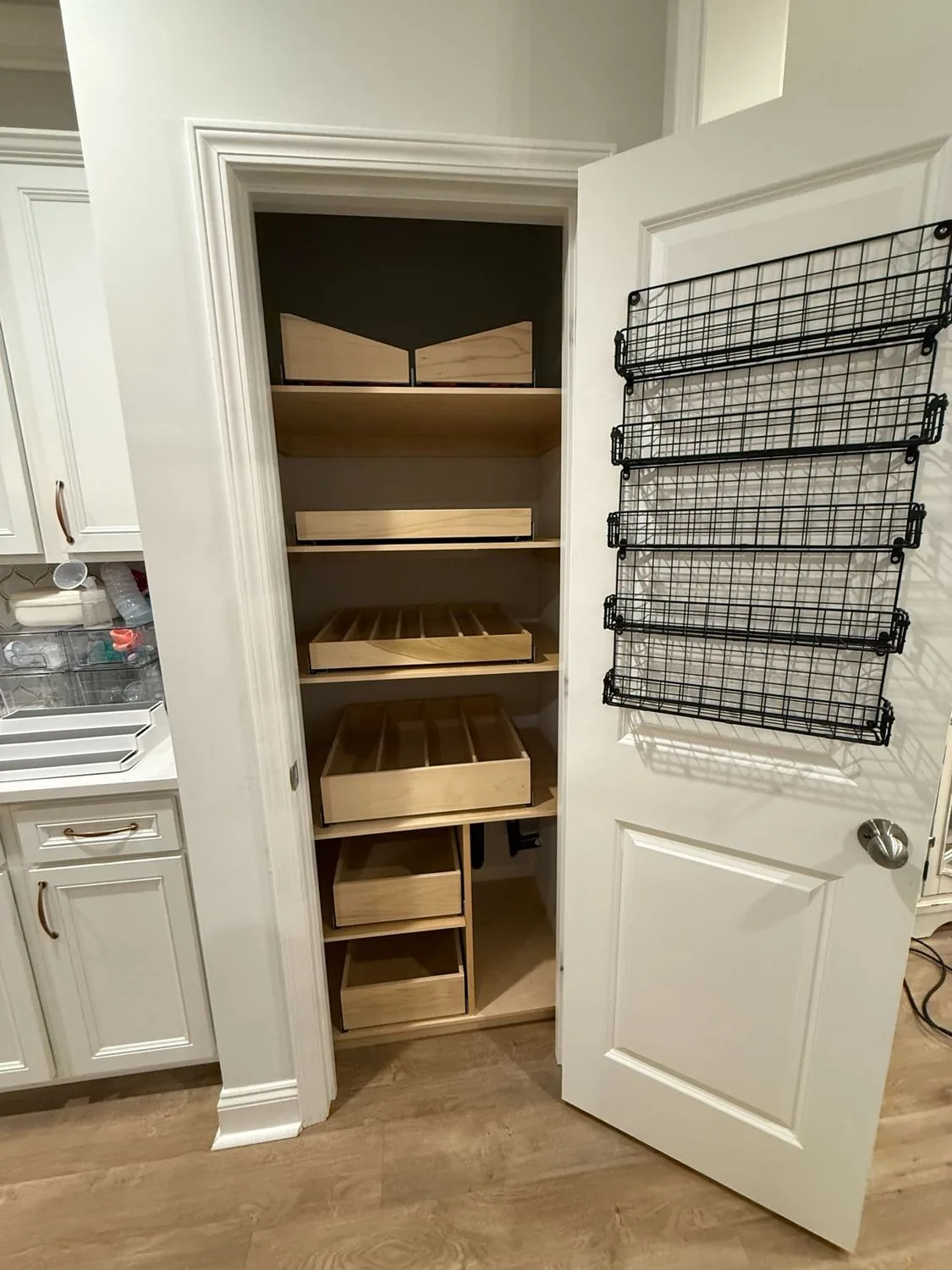 Custom pantry organizer with pull-out drawers