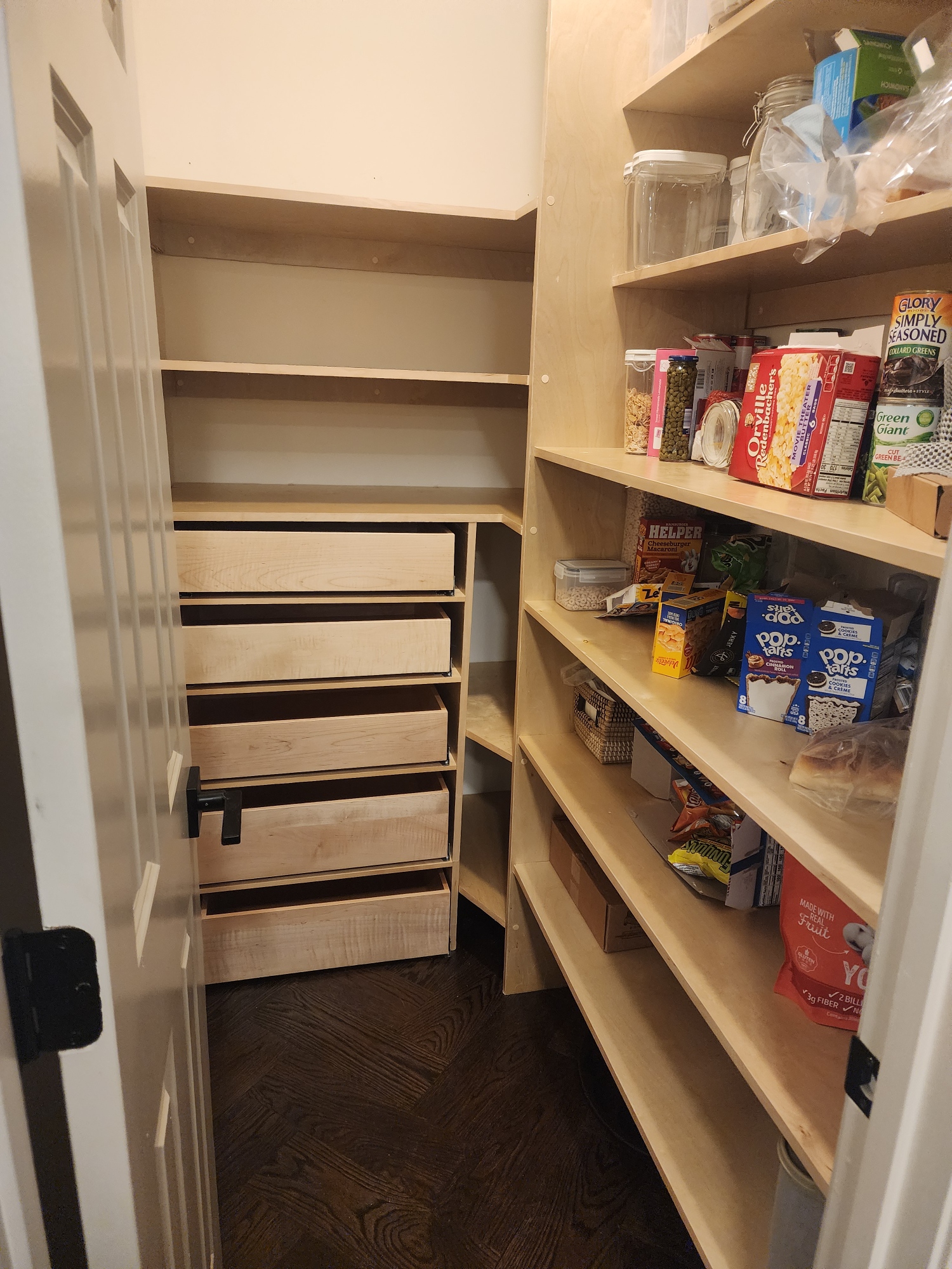 Custom pantry with shelving and pull-out drawers
