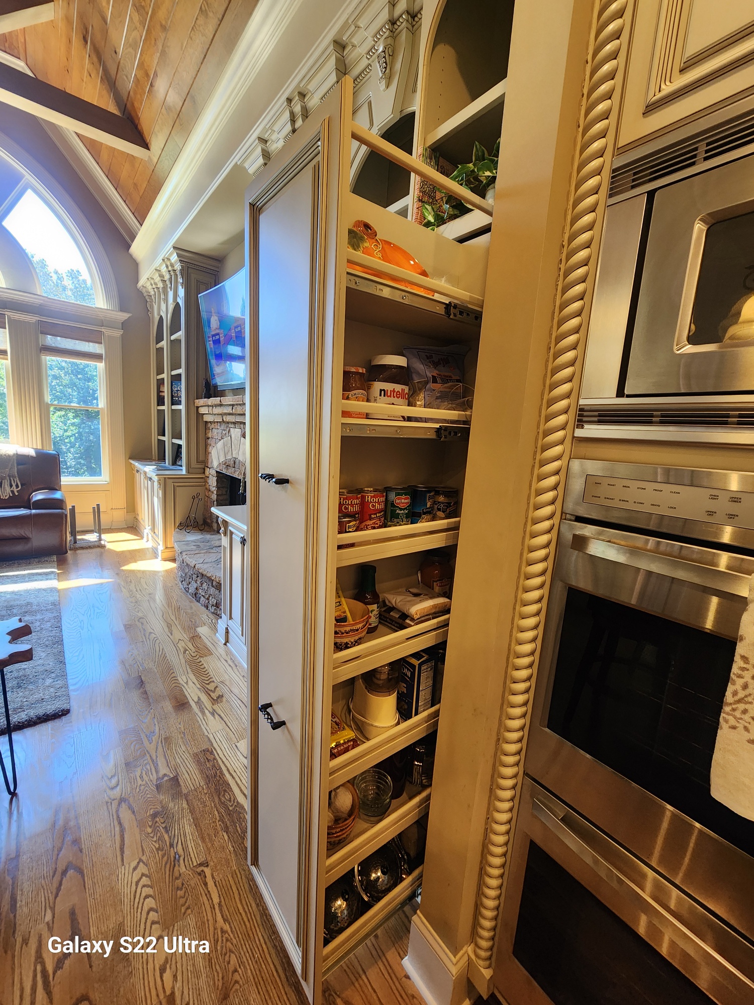 Custom kitchen pull-out pantry in upscale home