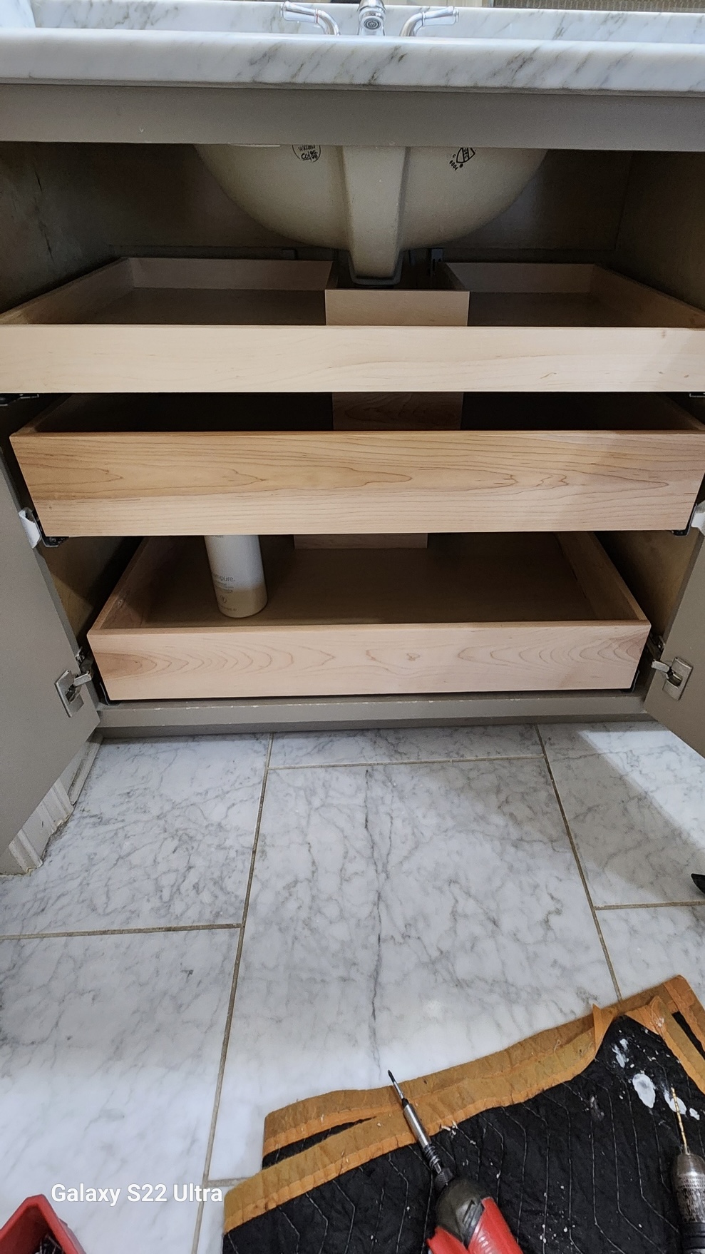 Custom under-sink pull-out drawers
